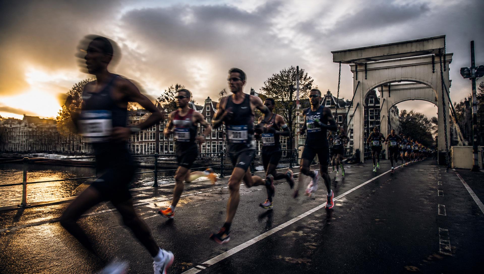 Runners chasing the finish line at sunrise